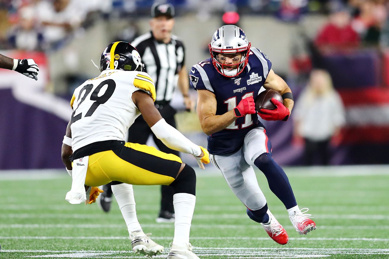 Julian Edelman #11 of the New England Patriots runs with the ball against the Pittsburgh Steelers at Gillette Stadium on September 08, 2019 in Foxborough, Massachusetts.