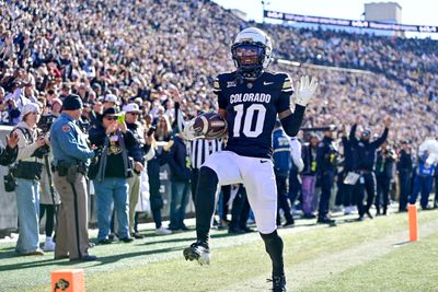 Colorado Buffaloes LaJohntay Wester celebrates a touchdown against the Oklahoma State Cowboys during a 2024 contest.