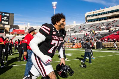 Texas Tech offensive lineman Caleb Rogers trots off the field after a contest against the West Virginia Mountaineers in 2024. 