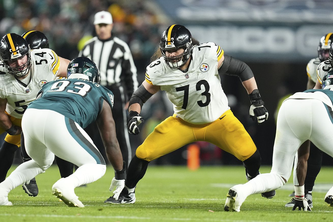 Isaac Seumalo #73 of the Pittsburgh Steelers blocks Milton Williams #93 of the Philadelphia Eagles at Lincoln Financial Field on December 15, 2024 in Philadelphia, Pennsylvania.