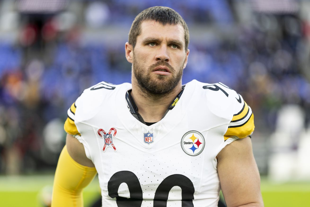 T.J. Watt #90 of the Pittsburgh Steelers looks on as he stretches prior to an NFL Football game against the Baltimore Ravens at M&T Bank Stadium on December 21, 2024 in Baltimore, Maryland.