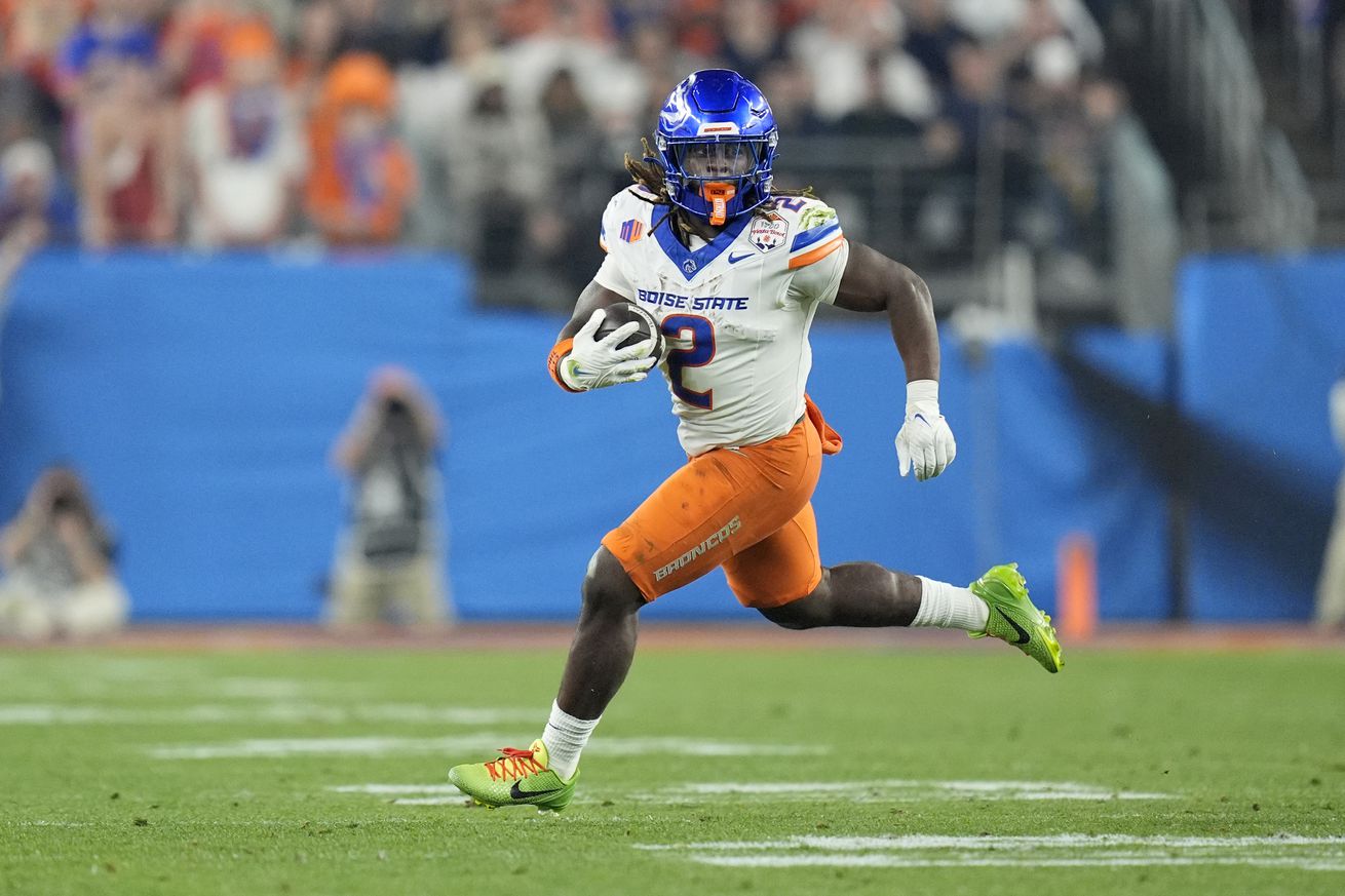 Running back Ashton Jeanty #2 of the Boise State Broncos running with the football against the Penn State Nittany Lions during the first half of the 2024 Vrbo Fiesta Bowl at State Farm Stadium on December 31, 2024 in Glendale, Arizona.