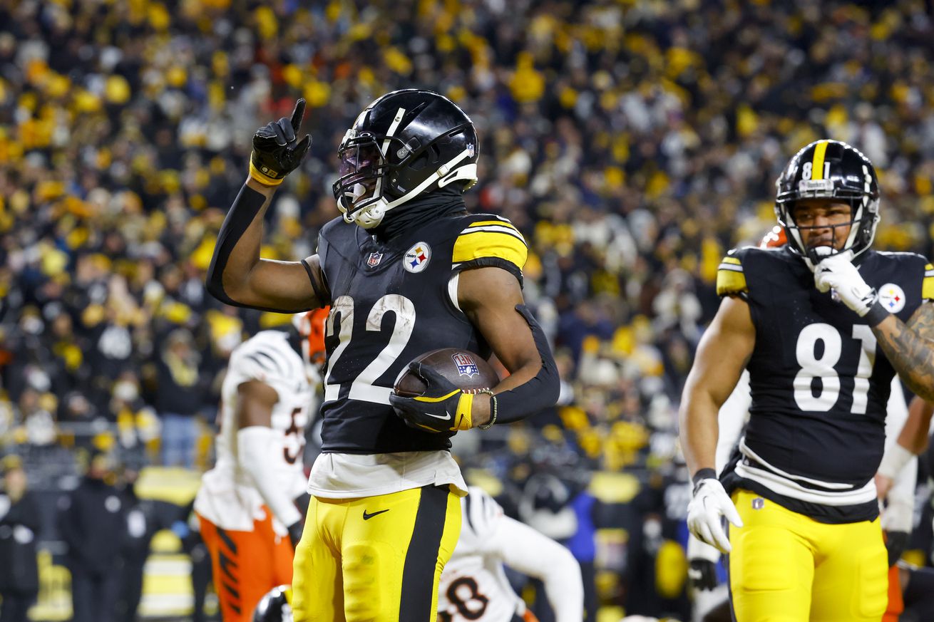 Najee Harris #22 of the Pittsburgh Steelers reacts after scoring a touchdown in the second quarter of a game against the Cincinnati Bengals at Acrisure Stadium on January 04, 2025 in Pittsburgh, Pennsylvania.