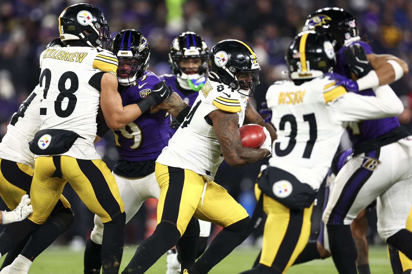 Cordarrelle Patterson #84 of the Pittsburgh Steelers carries the ball during the first half of an NFL football wild card playoff game against the Baltimore Ravens at M&T Bank Stadium on January 11, 2025 in Baltimore, Maryland.