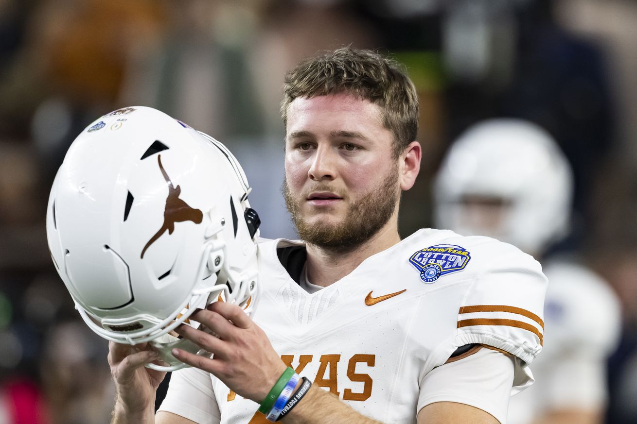 Quinn Ewers #3 of the Texas Longhorns during a game between the Ohio State Buckeyes and the Texas Longhorns at the Goodyear Cotton Bowl at AT&T Stadium on January 10, 2025 in Arlington, Texas.