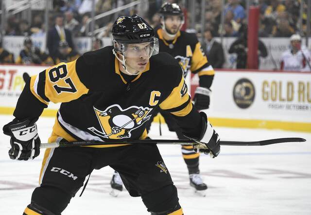 Penguins center Sidney Crosby waits in the faceoff circle against the Capitals on Oct. 4, 2018.