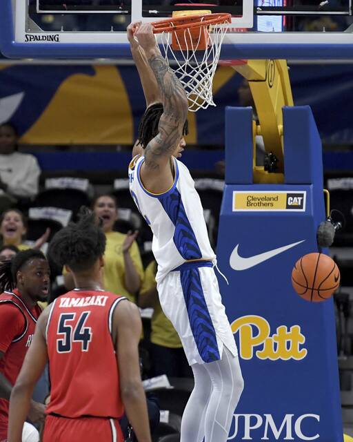 Pitt’s Cameron Corhen dunks during the first half against Radford on Monday, Nov. 4, 2024, at Petersen Events Center.