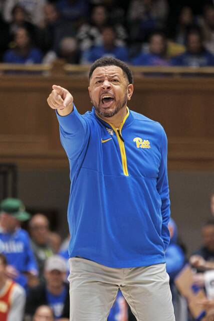 Pittsburgh head coach Jeff Capel directs his team during the first half of an NCAA college basketball game against Duke in Durham, N.C., Tuesday, Jan. 7, 2025. (AP Photo/Ben McKeown)