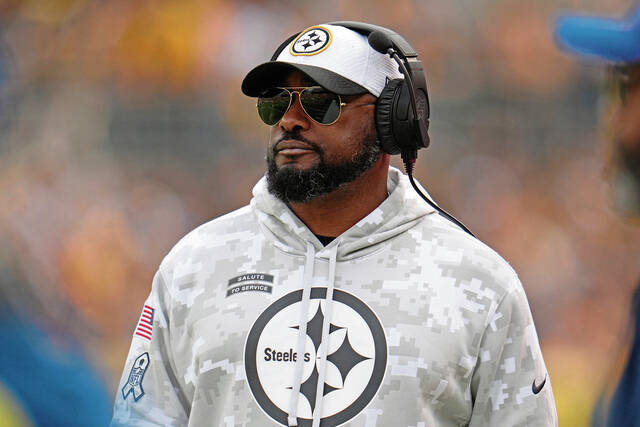 Steelers head coach Mike Tomlin walks the sideline in the first half of the Nov. 17 game against the Baltimore Ravens in Pittsburgh.