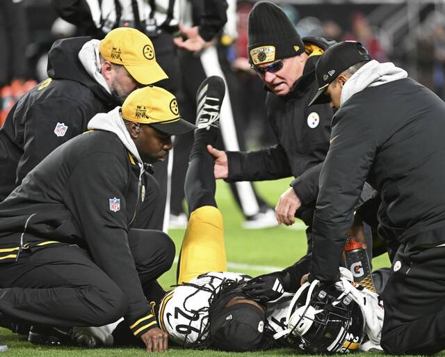 Steelers medical staff tends to cornerback Donte Jackson after getting hurt against the Eagles in the first quarter Sunday Dec. 15, 2024 at FirstEnergy Stadium.