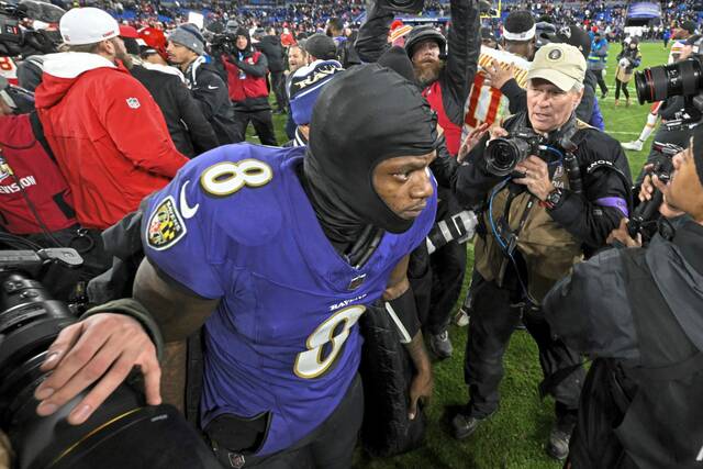 Baltimore Ravens quarterback Lamar Jackson (8) walks off the field after the AFC Championship NFL football game against the Kansas City Chiefs, in Baltimore, Sunday, Jan. 28, 2024.