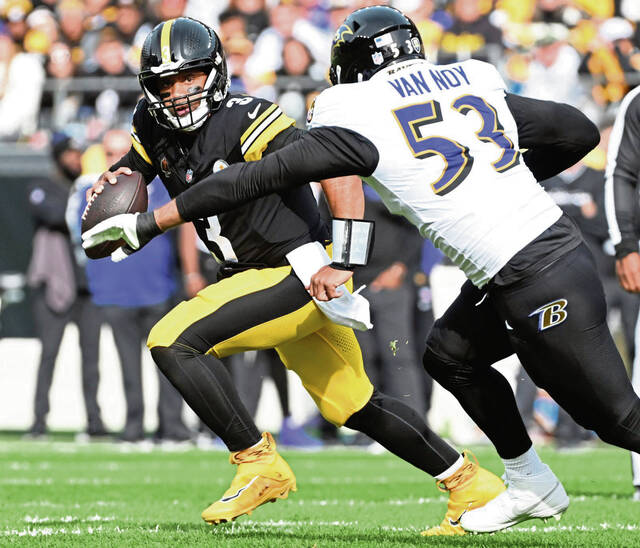 The Ravens’ Kyle Van Noy pressures Steelers quarterback Russell Wilson in the first quarter Sunday Nov. 17, 2024, at Acrisure Stadium.