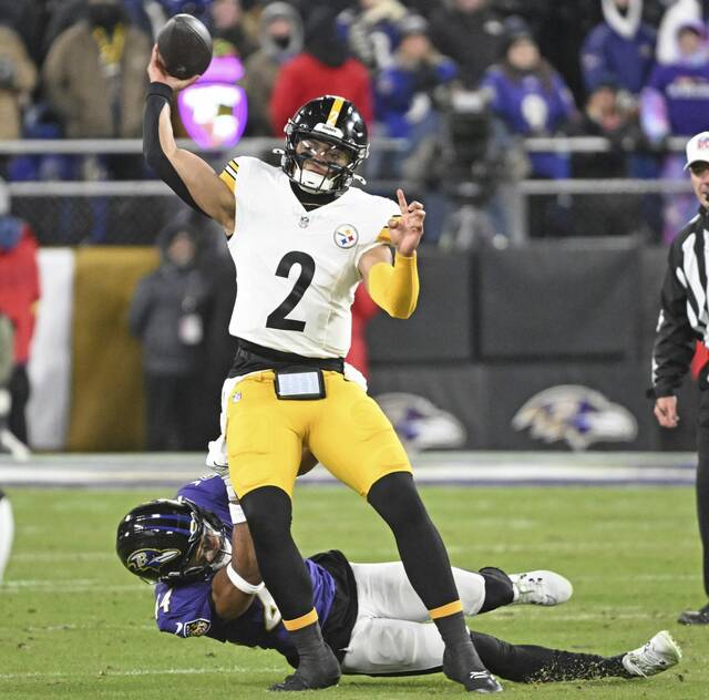 The Ravens’ Marlon Humphrey pressures Steelers quarterback Justin Fields in the second quarter Saturday.