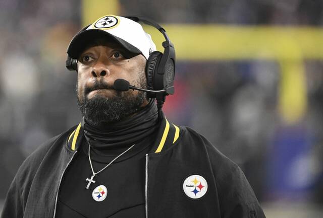 Steelers head coach Mike Tomlin on the sideline against the Ravens during the AFC Wild Card game Saturday at M&T Bank Stadium.