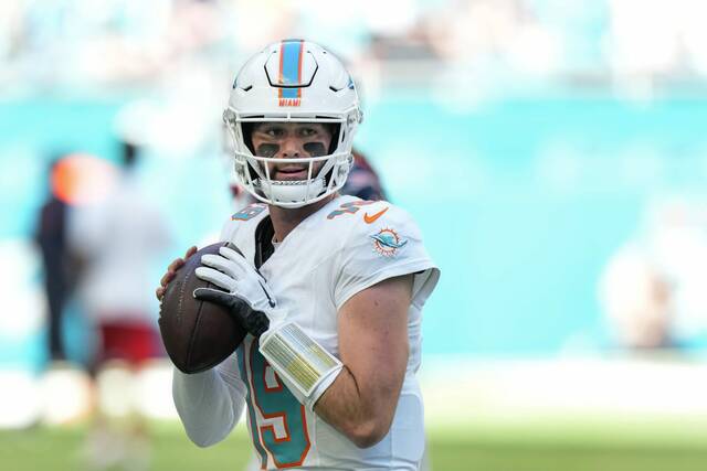 Miami Dolphins quarterback Skylar Thompson warms up before the start of an NFL football game against the New England Patriots, Sunday, Nov. 24, 2024, in Miami Gardens, Fla.