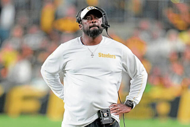 Pittsburgh Steelers head coach Mike Tomlin looks at a replay on the scoreboard during the half of an NFL football game against the New York Jets in Pittsburgh Sunday, Oct. 20, 2024.