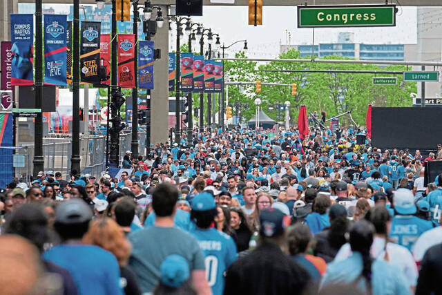 Crowds visit on the third day of the NFL football draft, Saturday, April 27, 2024, in Detroit.