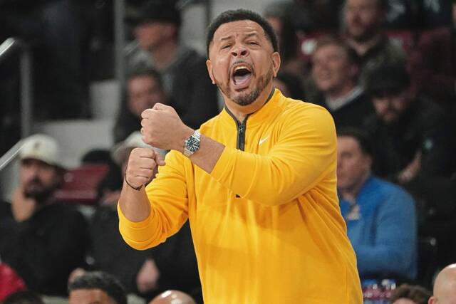 Pitt coach Jeff Capel calls out to his team during the second half against Mississippi State on Dec. 4.