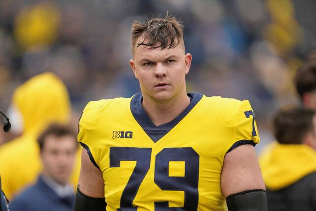 Michigan offensive lineman Jeffrey Persi (79) watches during the NCAA college football team’s spring game in Ann Arbor, Mich., Saturday, April 20, 2024.