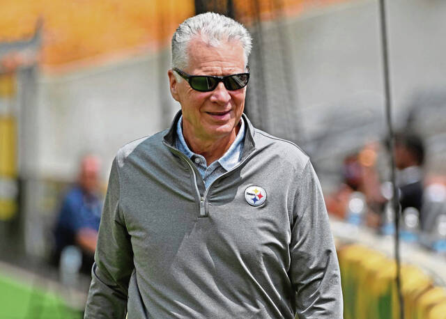 Steelers president Art Rooney II walks around the field during a joint practice with the Buffalo Bills on Aug. 15, 2024, at Acrisure Stadium.