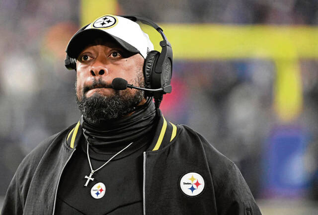 Steelers head coach Mike Tomlin walks the sideline as his team plays the Baltimore Ravens in an AFC wild-card game on Jan. 11 at M&T Bank Stadium.