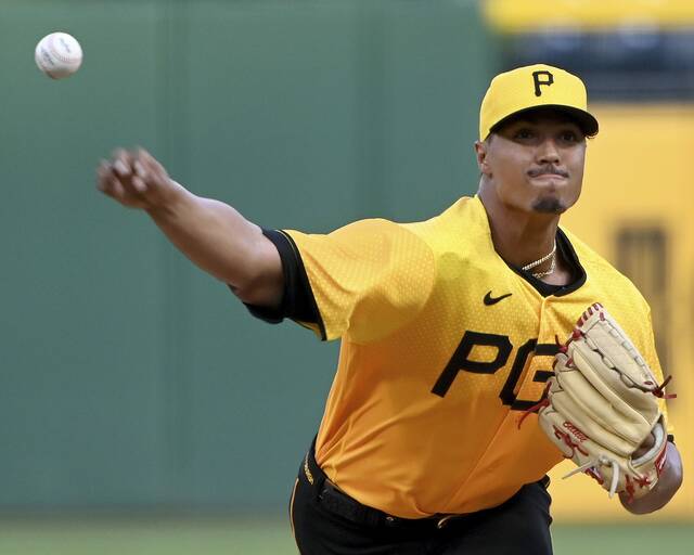 Pirates pitcher Johan Oviedo delivers during the first inning against the Reds on Friday, Aug. 11, 2023, at PNC Park.