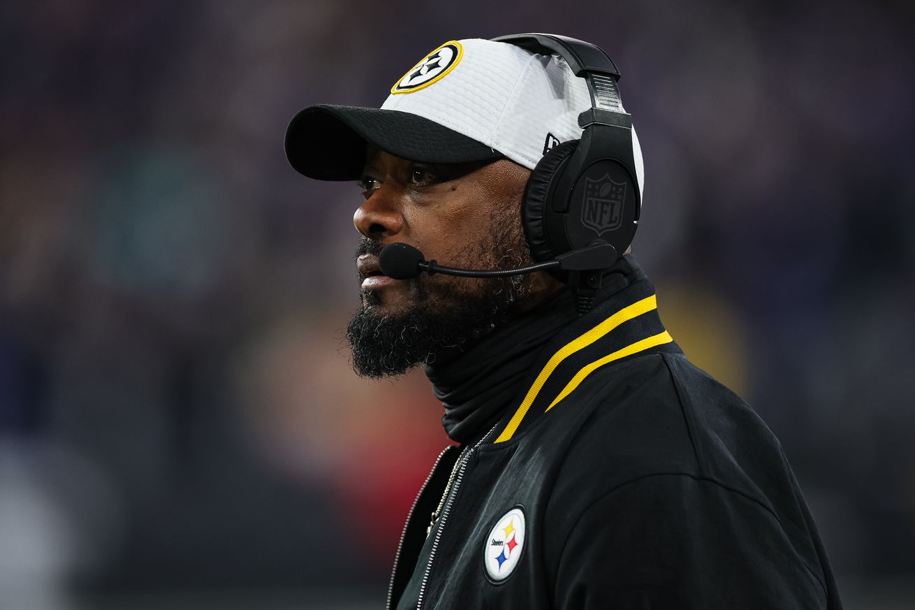 Head coach Mike Tomlin of the Pittsburgh Steelers looks on during the first half of the AFC Wild Card Playoff game against the Baltimore Ravens at M&T Bank Stadium on January 11, 2025 in Baltimore, Maryland.