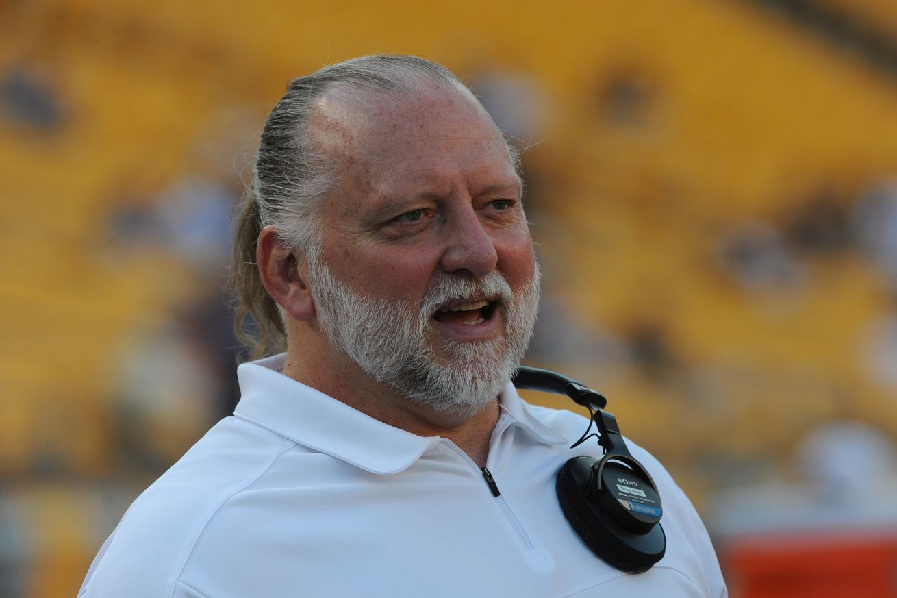 Craig Wolfley, former offensive lineman and current radio broadcaster for the Pittsburgh Steelers, looks on from the sideline before a preseason game between the Kansas City Chiefs and Steelers at Heinz Field on August 24, 2013 in Pittsburgh, Pennsylvania. The Chiefs defeated the Steelers 26-20.